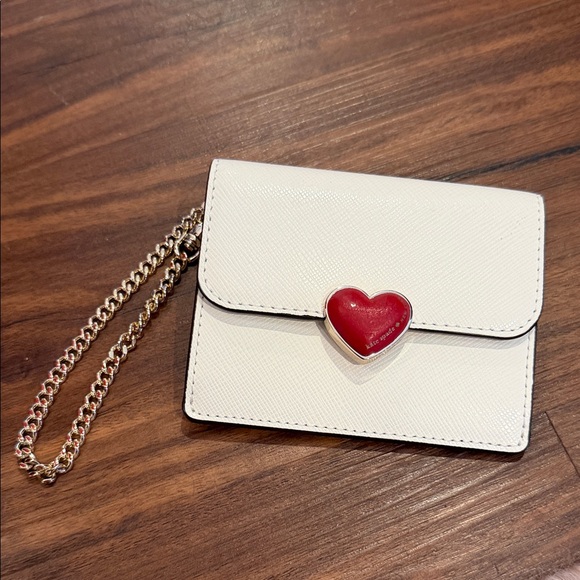 Kate Spade White Clutch with Red Heart Accent
